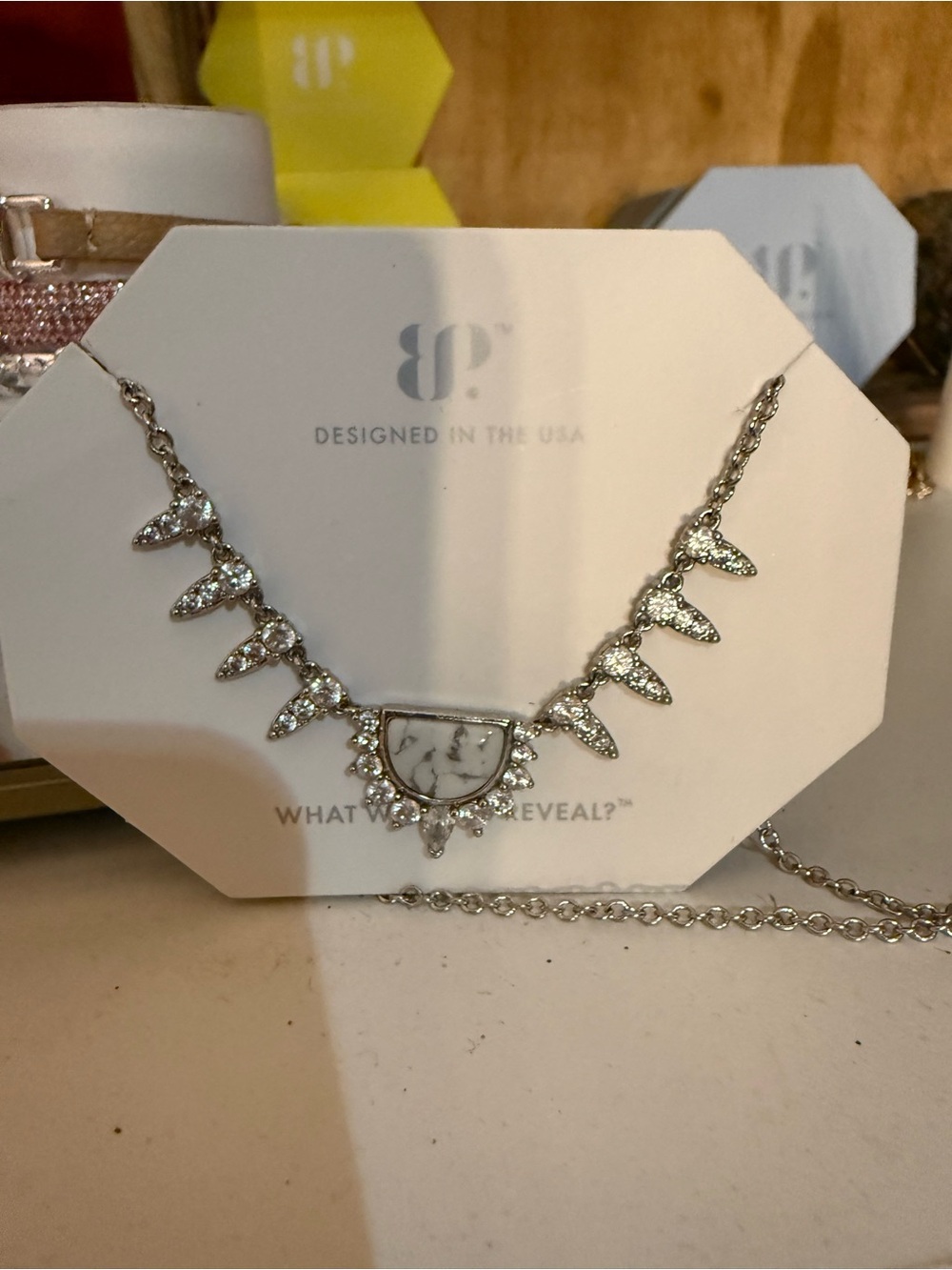 Howlite on rhodium